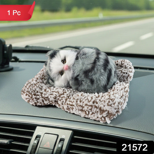 Cute car dashboard cat